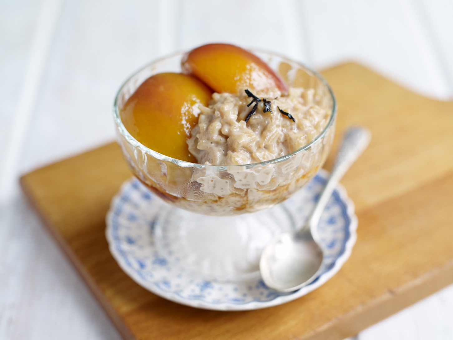 Earl Grey Amira rice pudding with wine, lemon and vanilla nectarines